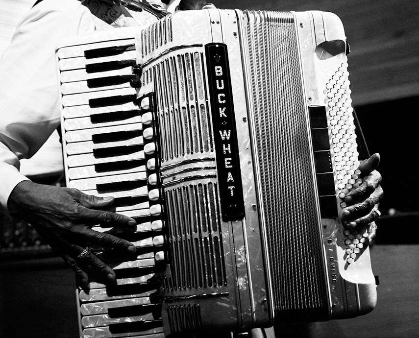 A black and white image of an acordian at 3 Keys live music venue