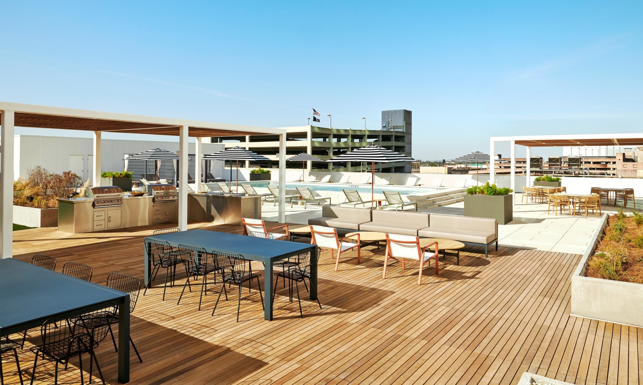 The Odeon rooftop deck with pool-side seating and other tables perfect for connecting and playing games.